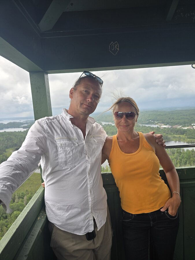 Kris and Sylvia Betkowski at the Temagami Fire Tower overlooking Lake Temagami